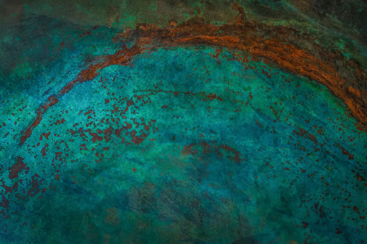 Close-up of green and teal oxidized copper patina