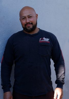 Extreme Plumbing field technician in company polo